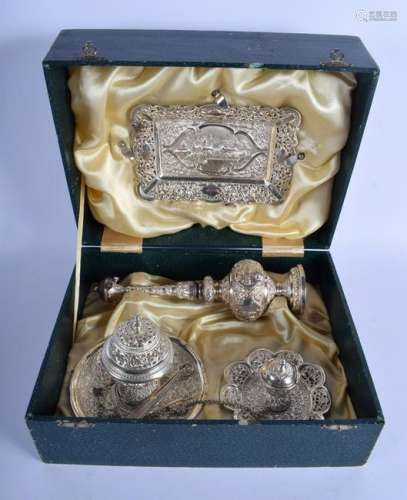 A CASED SET OF EARLY 20TH INDIAN SILVER decorated with