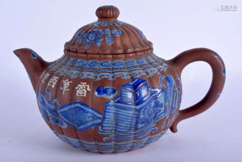 A CHINESE QING DYNASTY BLUE ENAMELLED TEAPOT AND COVER