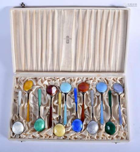 A CASED SET OF ART DECO SILVER AND ENAMEL TILLANDED