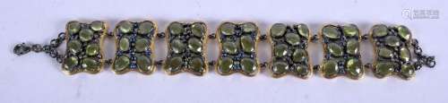 A VINTAGE YELLOW METAL PERIDOT SAPPHIRE AND DIAMOND