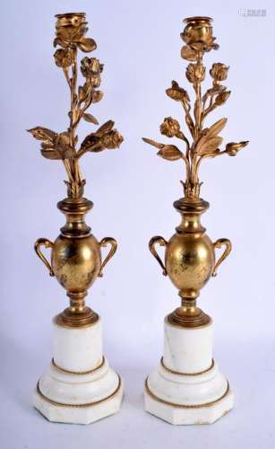 A PAIR OF 19TH CENTURY FRENCH BRONZE FLOWER VASES upon