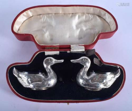A CASED PAIR OF ANTIQUE ENGLISH SILVER SALTS in the