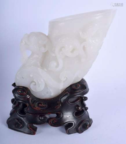 A LARGE EARLY 20TH CENTURY CHINESE WHITE JADE RHYTON
