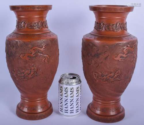 A LARGE PAIR OF 19TH CENTURY JAPANESE REDWARE POTTERY