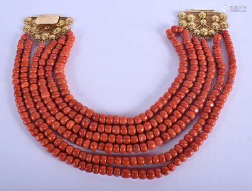 AN 18CT GOLD AND RED CORAL NECKLACE. 322 grams. Longest