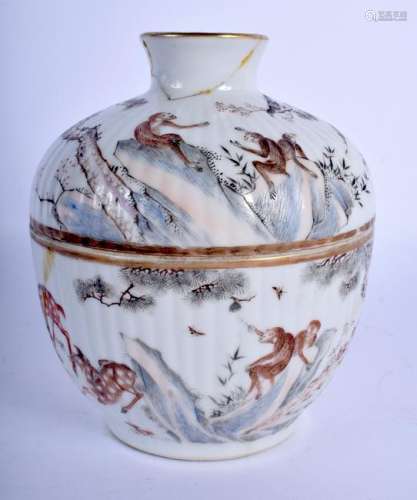 A 19TH CENTURY CHINESE FLUTED TEA BOWL AND COVER