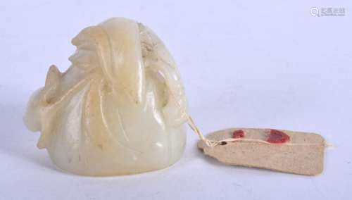 A LATE 19TH CENTURY CHINESE CARVED JADE FRUITING POD