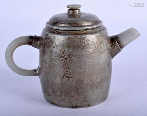 AN EARLY 20TH CENTURY CHINESE PEWTER OVERLAID YIXING
