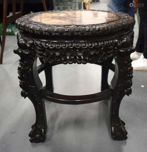 A 19TH CENTURY CHINESE HARDWOOD MARBLE INSET STAND