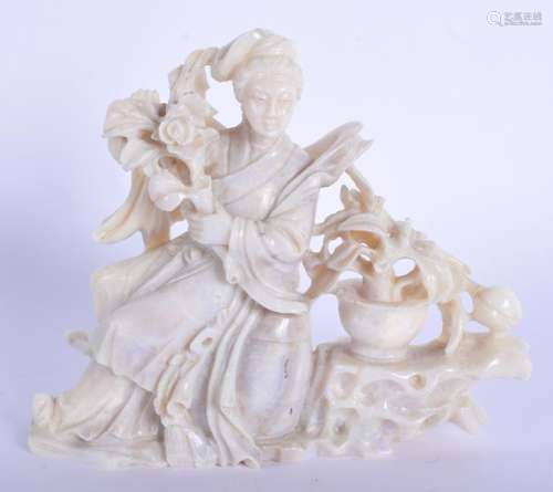 AN EARLY 20TH CENTURY CHINESE CARVED OPAL FIGURE OF