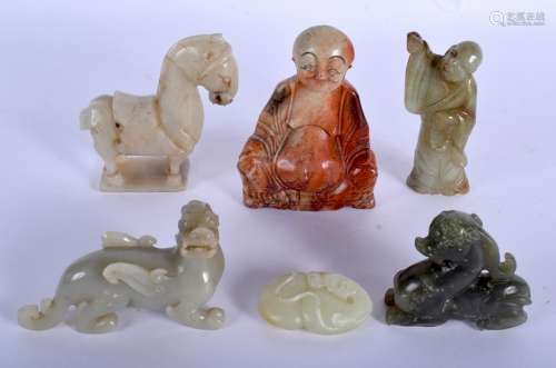AN EARLY 20TH CENTURY CHINESE CARVED JADE FIGURE OF A