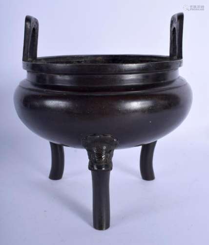 A 19TH CENTURY CHINESE TWIN HANDLED BRONZE CENSER