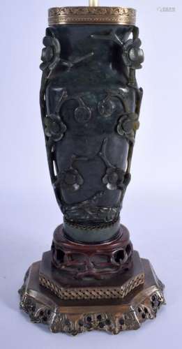 A LARGE 19TH CENTURY CHINESE CARVED JADE VASE converted