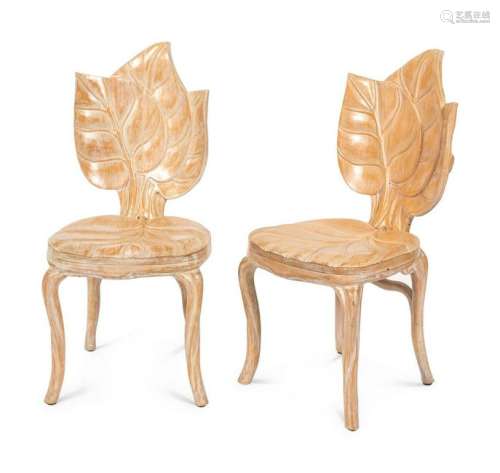 A Set of Four Carved Wood Leaf Chairs