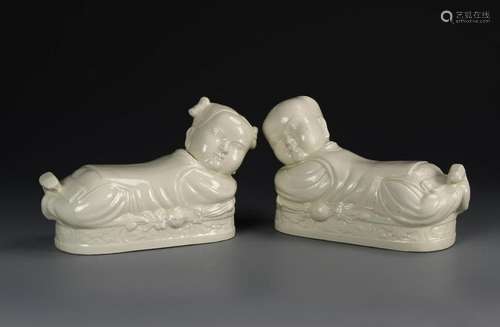 Pair of Chinese White Glazed Kids