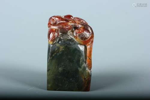 A Spinach Green And Russet Jade Carved 