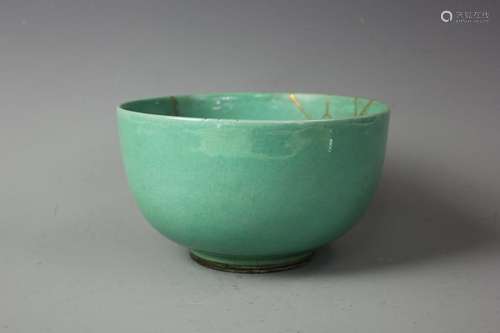 A Green Glazed Bowl ( Minor Restoration)