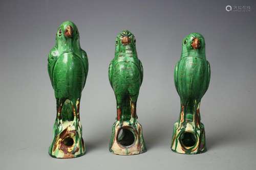 Three Green Glazed Figures of Parrots