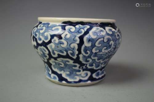 A Dark Blue And White Jar