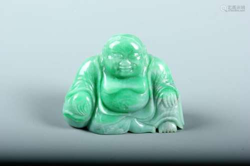 A Jadeite Figure Of Sitting Buddha