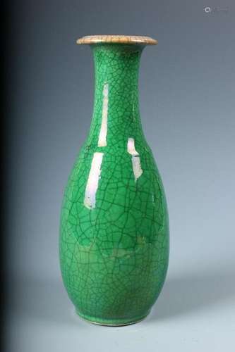 A green glazed vase