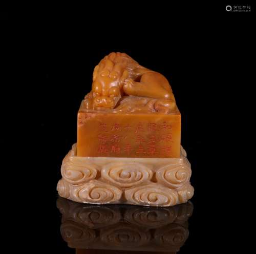 A Chinese Tianhuang Soapstone Seal Shaped in a Dragon with a Furong Pedestal