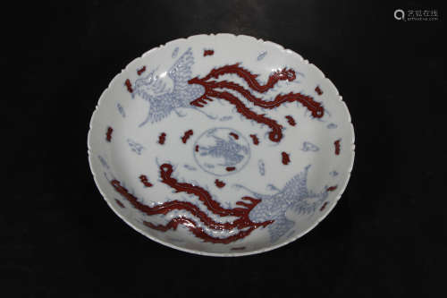A Chinese Porcelain Plate Patterned with Clouds and Phoenixes
