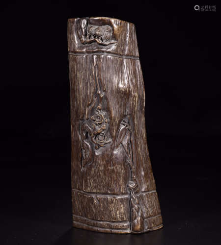 A CHINESE AGALWOOD CARVED SCHOLAR'S BRUSH ARM REST