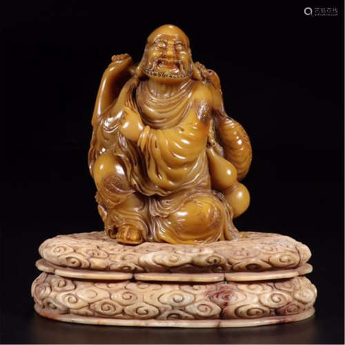 A CHINESE SOAPSTONE TIANHUANG OLD MAN TABLE ITEM