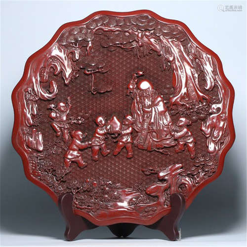 A CHINESE LACQUER MAN UNDER TREE AND BOY CINNABAR PLATE