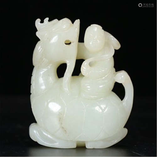 A CHINESE WHITE JADE CARVING BOY ON MYTHICAL BEAST