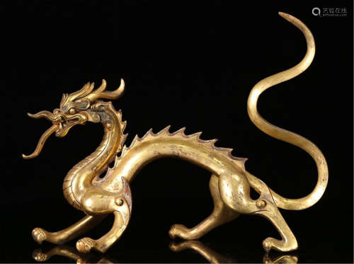 A CHINESE GILT BRONZE DRAGON TABLE ITEM