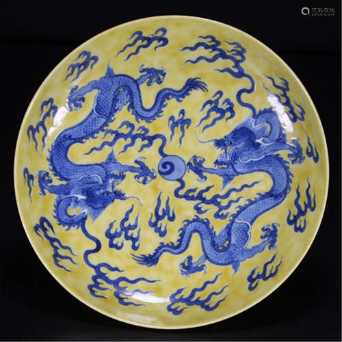 A CHINESE YELLOW GROUND BLUE DRAGON PLATE