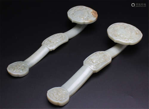 A PAIR OF CHINESE CARVED JADE RUYI SCEPTERS