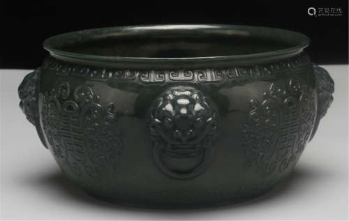 A CHINESE CARVED SPINACH JADE HANDLE INCENSE BURNER