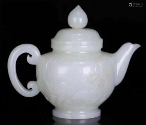 A CHINESE CARVED HETIAN JADE TEA POT