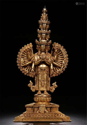 A CHINESE GILT BRONZE THOUSAND HANDS STANDING GUANYIN