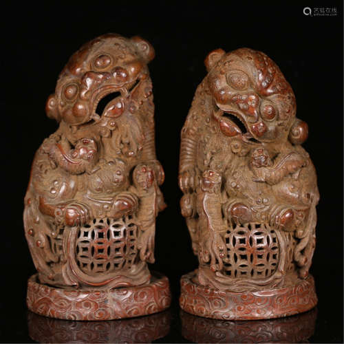 A PAIR OF CHINESE CARVED BAMBOO LION INCENSE CAGES