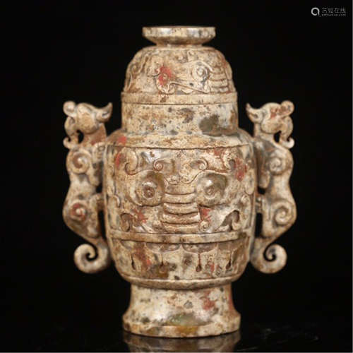 A CHINESE CARVED GAOGU JADE BEAST HANDLE LIDDED BOTTLE