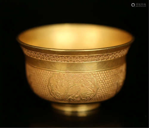 A CHINESE GOLD FIGURE UNDER TREE CUP