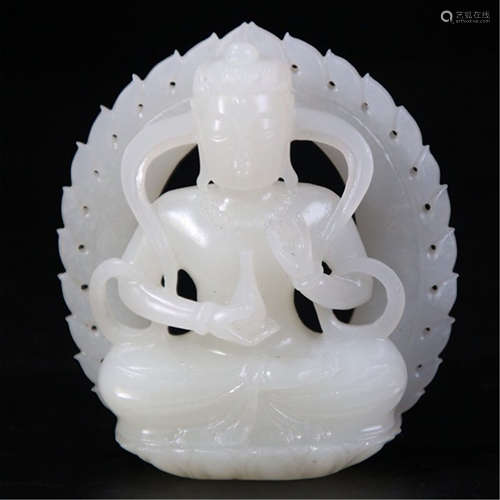 A CHINESE CARVED WHITE JADE SEATED GUANYIN