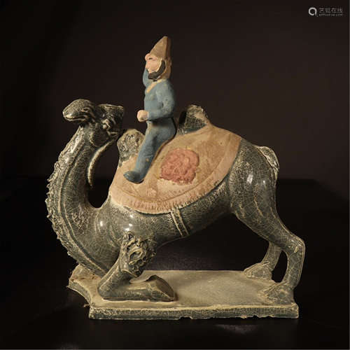 A CHINESE SANCAI POTTERY MAN ON CAMEL TABLE ITEM