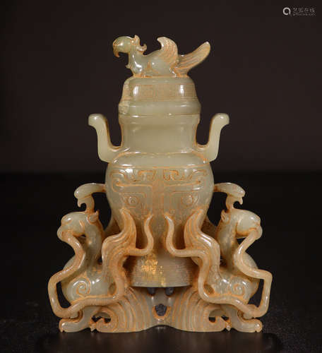 A CHINESE CARVED JADE PHOENIXS LIDDED BOTTLE