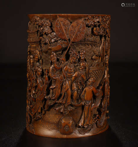 A CHINESE CARVED WOOD WOMEN UNDER PINE BRUSH POT