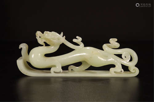 A CHINESE CARVED JADE DRAGON TABLE ITEM