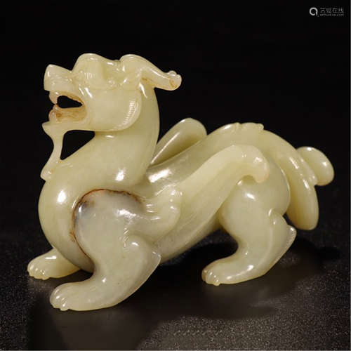 A CHINESE HETIAN WHITE CARVED JADE BEAST TABLE ITEM