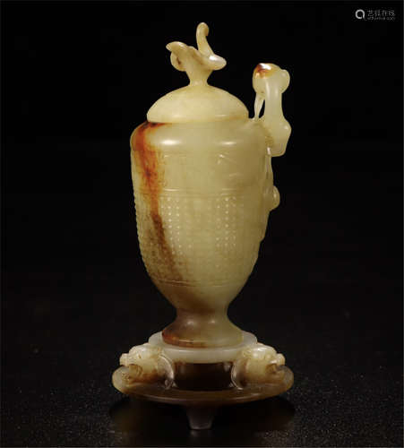 A CHINESE CARVED JADE DRAGON LIDDED CUP