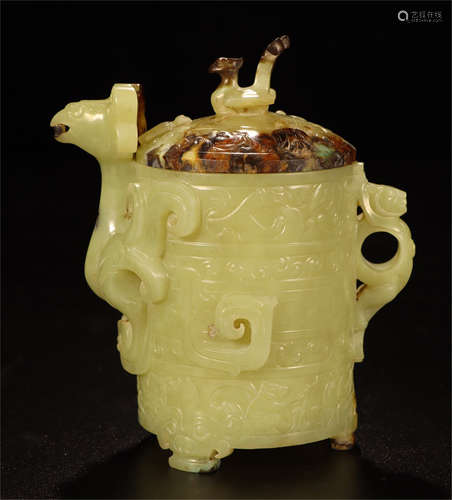 A CHINESE CARVED JADE PHOENIX LIDDED CUP