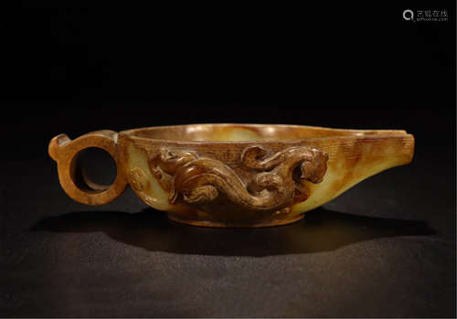 A CHINESE CARVED JADE DRAGON HANDLE CUP