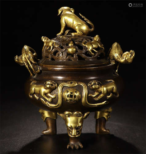 A CHINESE GILT BRONZE LION PLAYING BALL INCENSE CAGE